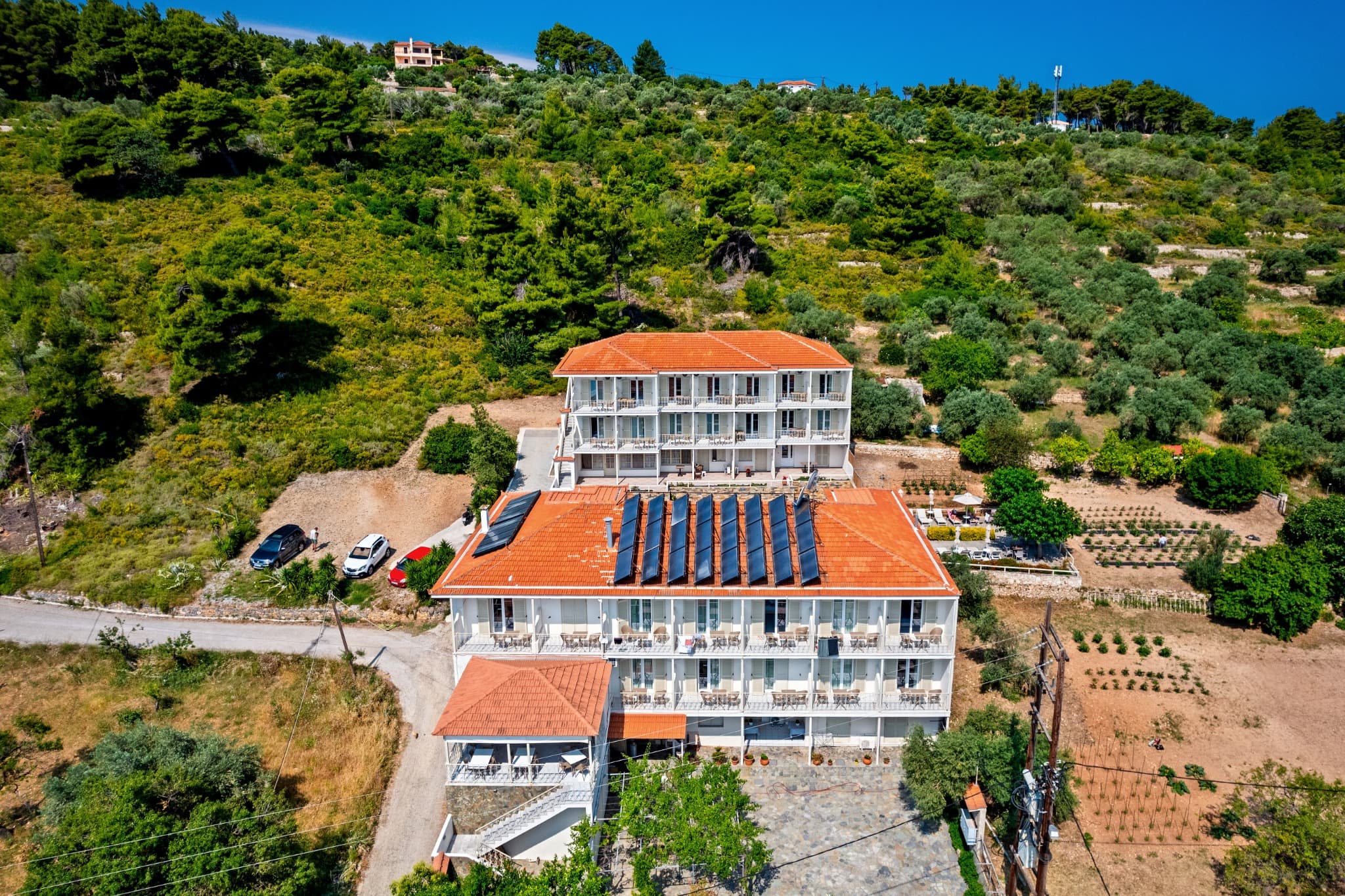 The hotel seen from above, set into the hillside